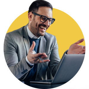 Man laughing at a computer gesturing with hands on a yellow background
