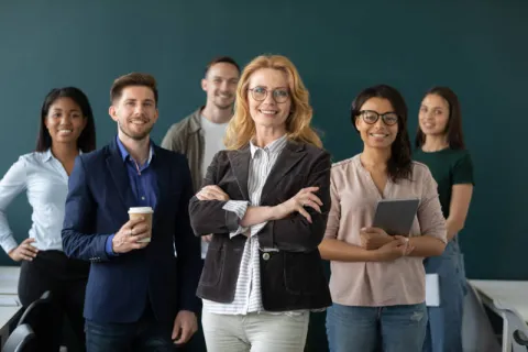 A group of educational leaders posing for the camera